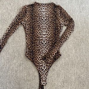 Brand new naked wardrobe bodysuit